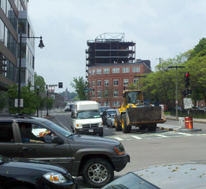 24 May 2011 first shot The new student residence appears to float above 801 Albany St, when looking down Albany St. westbound at the Mass. Ave. intersection