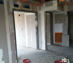 Inside apartment dry wall. Dry wall work continues