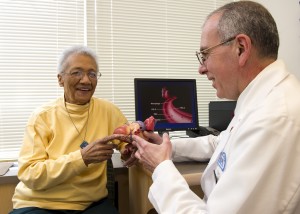 Dr. Gary Balady, who specializes in cardiovascular disease, with a patient.