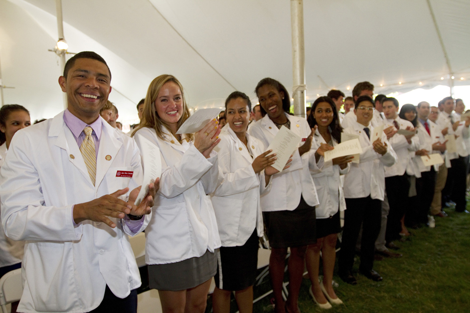 Members of the School of Medicine Class of 2016 sport both new white coats and big smiles after taking the Hippocratic Oath at the school’s White Coat Ceremony. BU Today photo by Chitose Suzuki