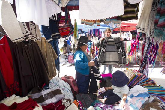 Stephanie Feldman (MED'14) checks out a hand-woven sweater in a Riobamba market.