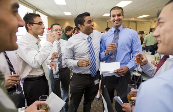 Graduating medical students Ricardo Cruz, from left, Arun Ganesh, Luis Meggo Quirros, Pranab Barman, and Shethal Bearelly celebrate during Match Day March 17, 2011 in Hiebert Lounge.