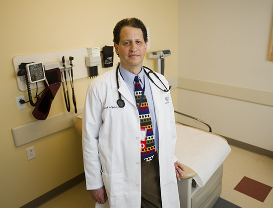 Daniel Alford (SPH’86, MED’92), a School of Medicine associate professor of medicine and the assistant dean for continuing medical education, is leading the effort to expand MED’s opioid and addiction curriculum. Photo by Cydney Scott