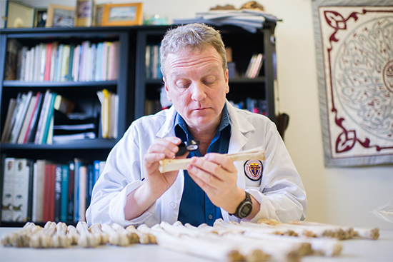 Forensic anthropologist James Pokines studies how bones “weather,” or break down when left outside. His recent work found that freeze-thaw cycles are an important component of weathering.