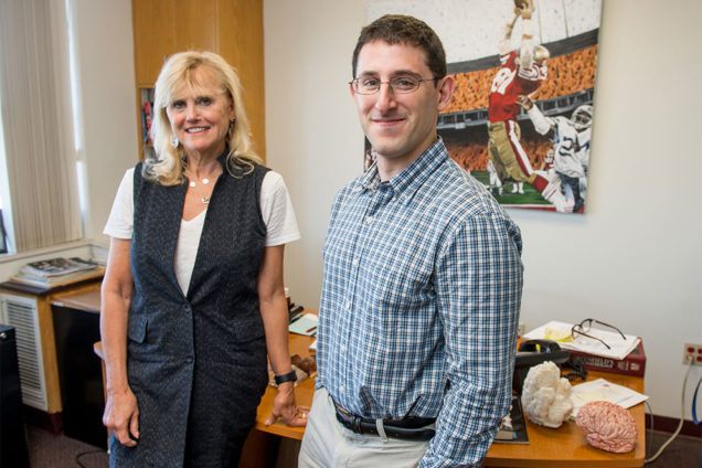 Ann McKee (left), director of BU’s CTE Center, and Jonathan Cherry, a School of Medicine postdoctoral fellow, have written a study, published Tuesday, reporting that a new chronic traumatic encephalopathy biomarker has been discovered that could potentially allow diagnosis of the disease during life. Photo by Cydney Scott