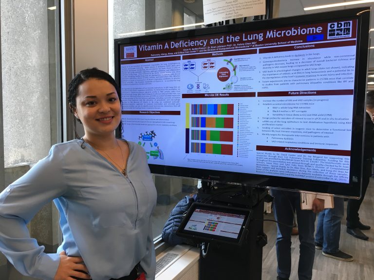 graduate student Kiloni Quiles of the Johnson Lab-Franco presenting a poster at Evans Day