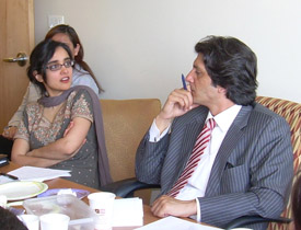 Anita Raj (left) meets with members of a  delegation from Pakistan to discuss  gender-based violence.