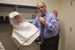 Corley with a Tyvek hood used by researchers in Biosafety Level-3 laboratories