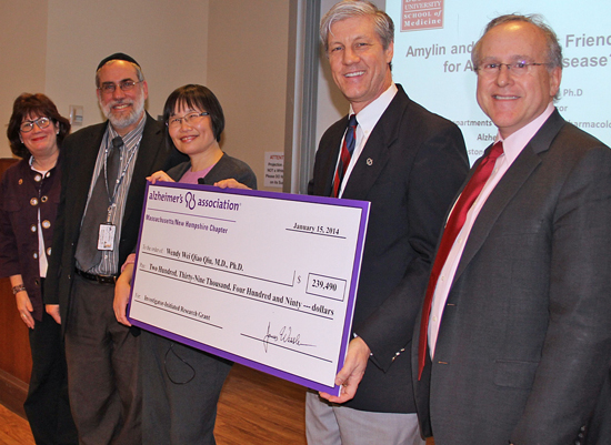Participating in the Alzheimer’s Association award present are Lenore Jackson-Pope of the Alzheimer’s Association; Neil Kowall, MD; Wendy Qui, MD, PhD; Peter Ham of the Alzheimer’s Association and Robert Stern, PhD. Photo by Sara Cody