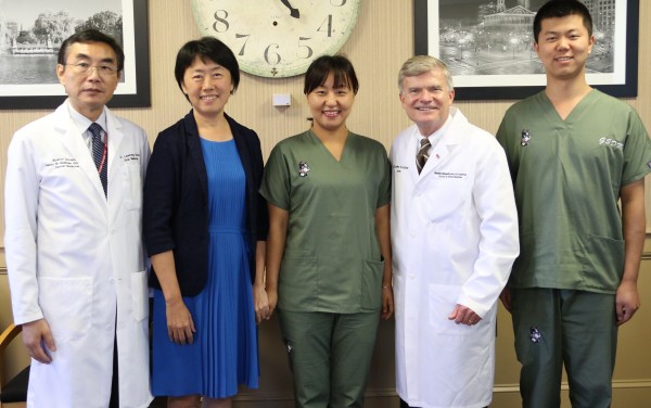 Dean Jeffrey W. Hutter and Dr. Laisheng Chou with Dr. Yumei Zhang, Dr. Jing Gao, and Dr. Lingzhou Zhao from FMMUSS 