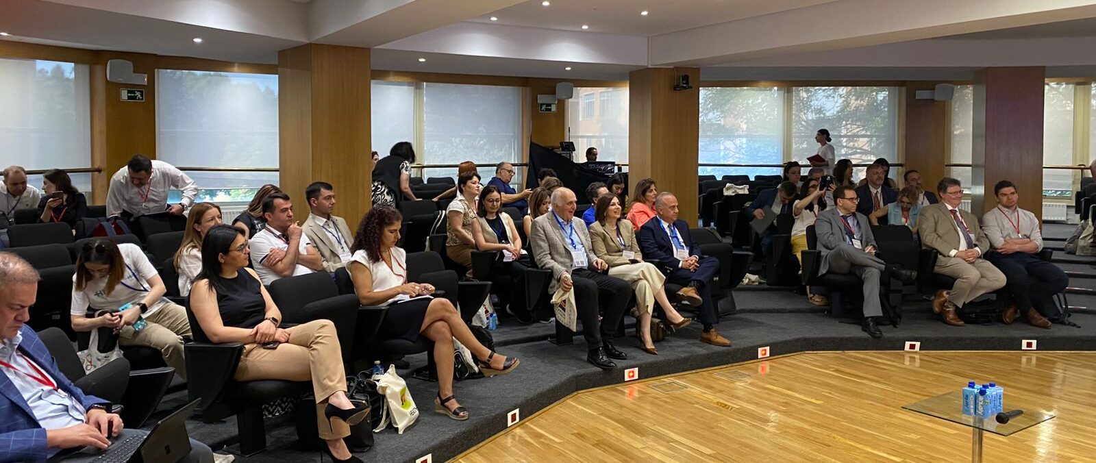 Participants listening to presentations