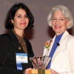 Marie-France Memierre, MD (left) receives the 2009 Women's Dermatolgoic Society President's Award.