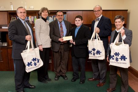 From left to right: Robert Stern, Ph.D., co-director of BUSM’s Alzheimer’s Disease Center, Karen Antman, MD, dean of BUSM and provost of Boston University Medical Campus, Neil Kowall, MD, BUSM professor of neurology and pathology, Max Wallack, Boston University Academy sophomore, James Berkman, head of Boston University Academy, Ben Wolozin, MD, Ph.D., BUSM professor of pharmacology and neurology.