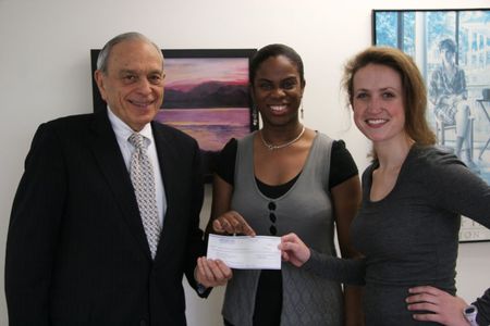AOA Project BUSM Associate Dean Barry Manuel, MD, presenting Alpha Omega Alpha Service Award to Nahomy Calixe ’11 and Hillary Johnston-Cox ‘15