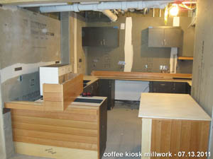 Progress in coffee kiosk area. The millwork has been installed, awaiting counters. Progress in coffee kiosk area. The millwork has been installed, just waiting for countertops.
