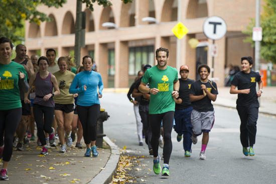 Owen Kendall (MED’15) leads a group of Rookie Runners and Forest Hills Runners recently. Photos by Cydney Scott