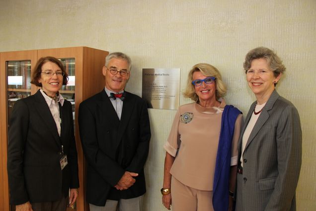 Alumni Medical Library Director Mary Blanchard, John Noble, Ewa Kuligowska-Noble, and Dean Karen Antman.
