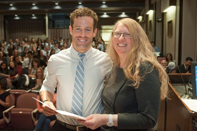 Own Kendall receiving the USPHS award from Karen Symes, PhD