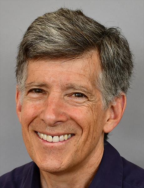 Headshot of Ben Wolozin smiling broadly