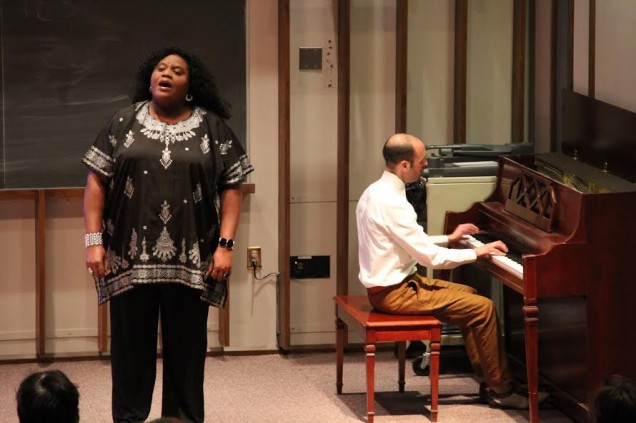 BMC patient Dina Jerome singing "Motherless Child" as Moises Fernandez Via accompanies her on piano.