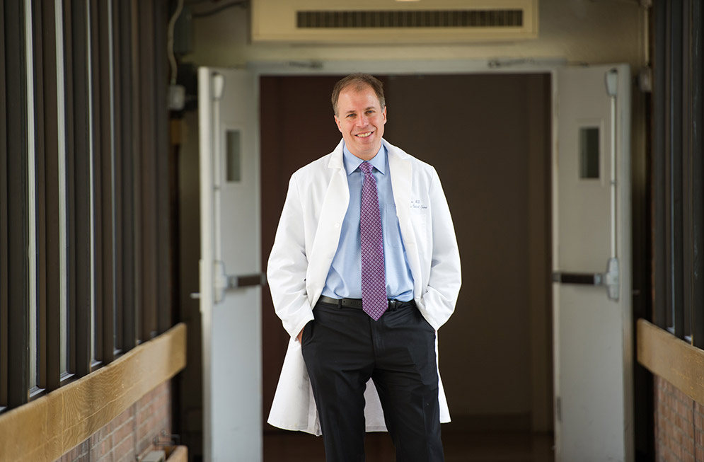 MED’s Avrum Spira, a pulmonary physician scientist who has devoted his career to research on early detection of lung cancer, leads a Stand Up to Cancer lung cancer interception dream team. Photo by Cydney Scott