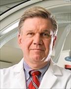 Head and shoulders image of William Boden wearing whitecoat