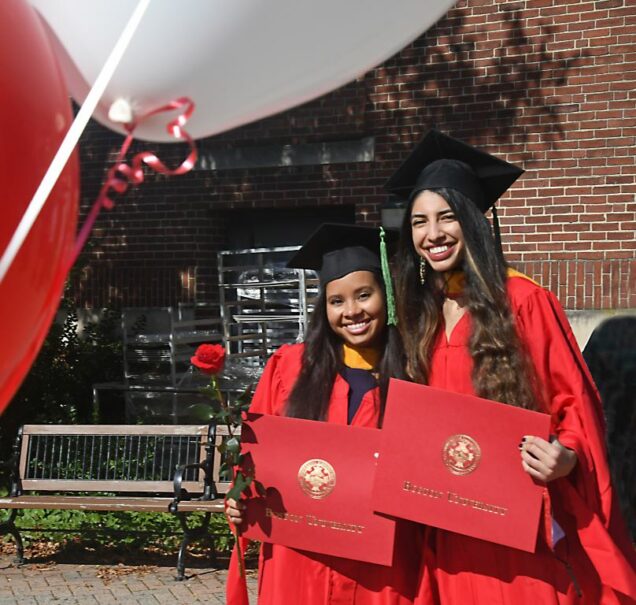 Erica Camacho and Laila Khatib in front of Instructional building.