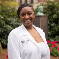 Bailie JacksonBailie Jackson wearing her white coat after the 2022 White Coat Ceremony.