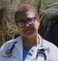 Headshot of Dr. Chapman in her whitecoat.