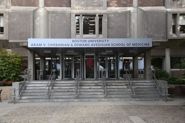 new sign over stairs on the front of the instructional building