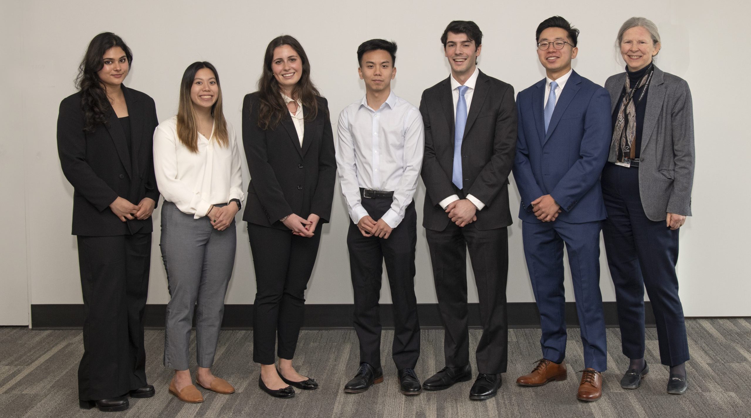 Photo of medical students with Dean Karen Antman, MD