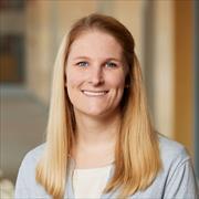 head and shoulders of Sophie Claudel, long straight blond hair, smiling