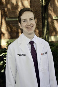 Andrew Pendergrass in white coat