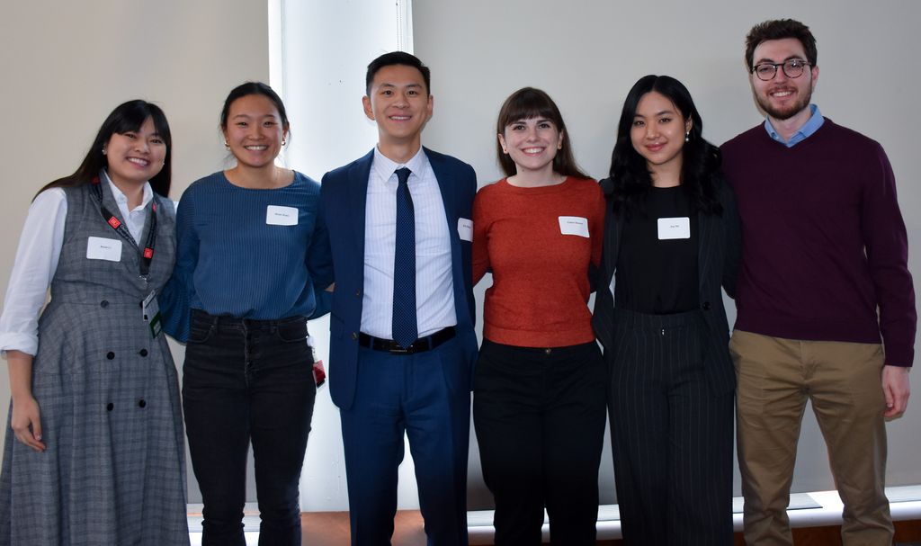 student presenters lined up smiling