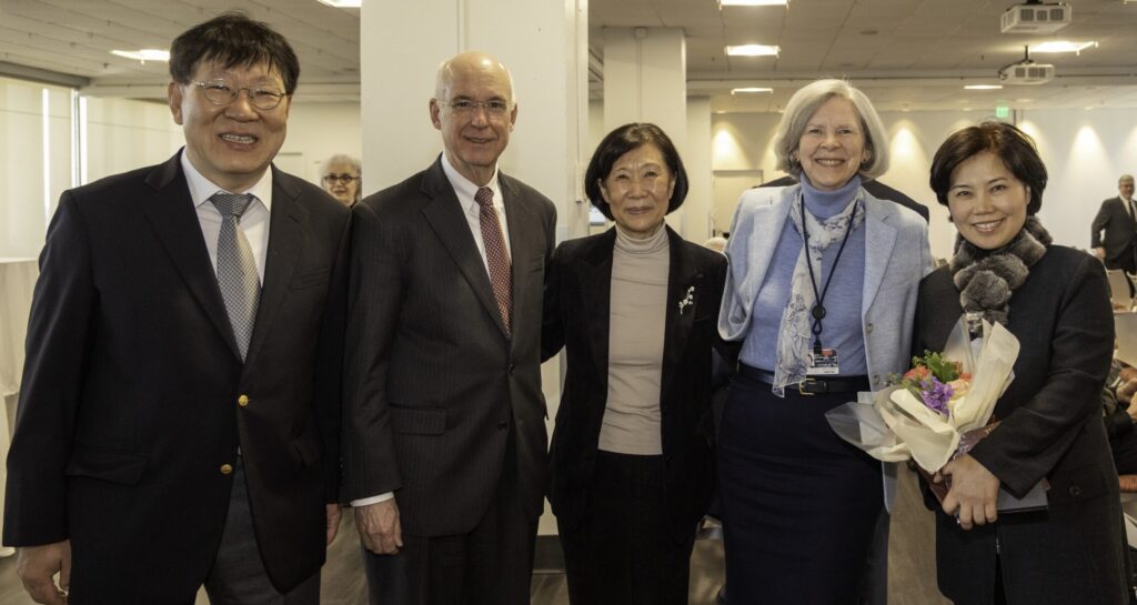 Hee-Young Park with her family and President Freeman and Dean Antman