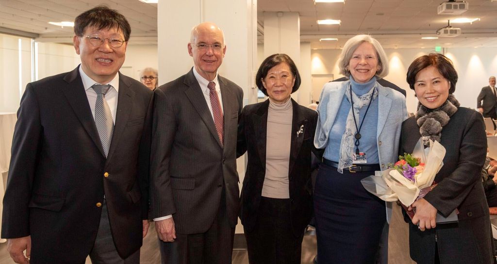 Hee-Young Park with her family and President Freeman and Dean Antman