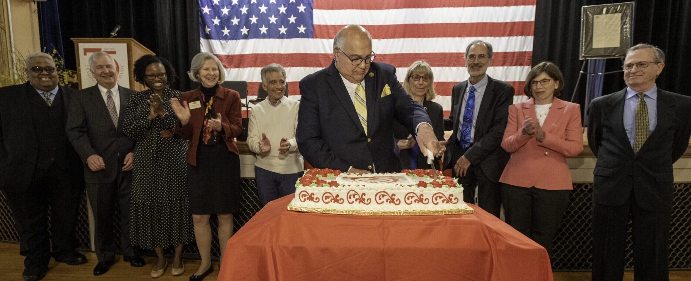 Mayor Sisitsky cuts large cake