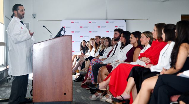 Oren Berkowitz at podium delivering PA whitecoat keynote address