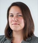 headshot of Nicole Spartino, shoulder length straight brown hair