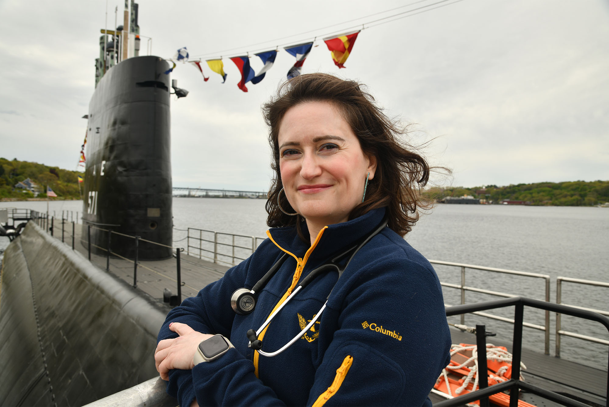 Photo of Adrienne Parad, MD’07, in front of the historic USS Nautilus