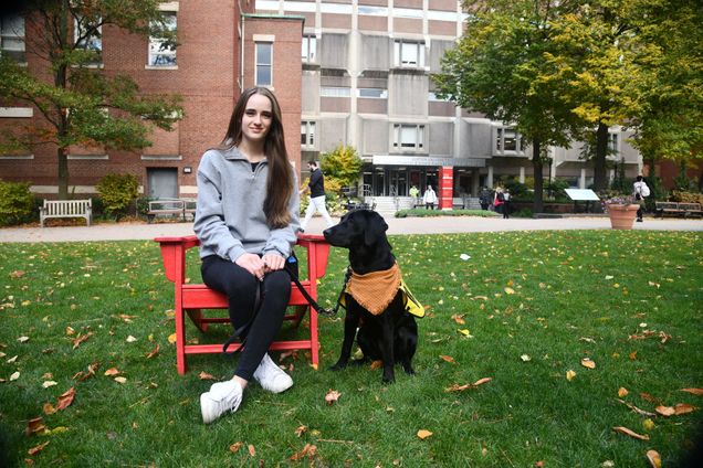 Alexis Kruger and her service dog, Judy, on Talbot Green