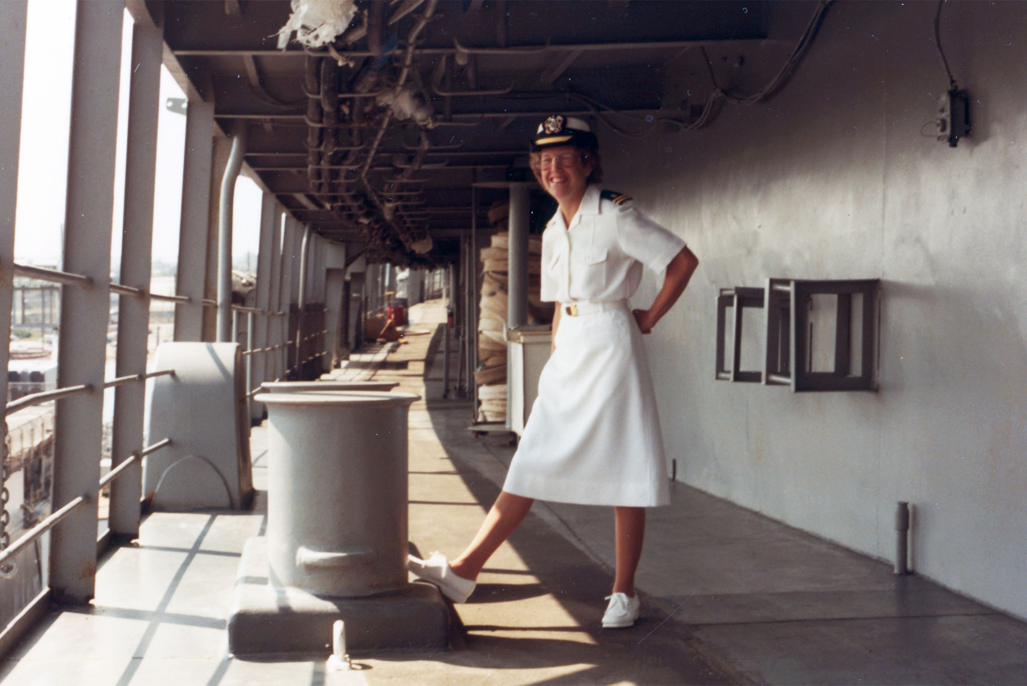 Photo of Christine Hunter, MD'80 in uniform on USS Hunley
