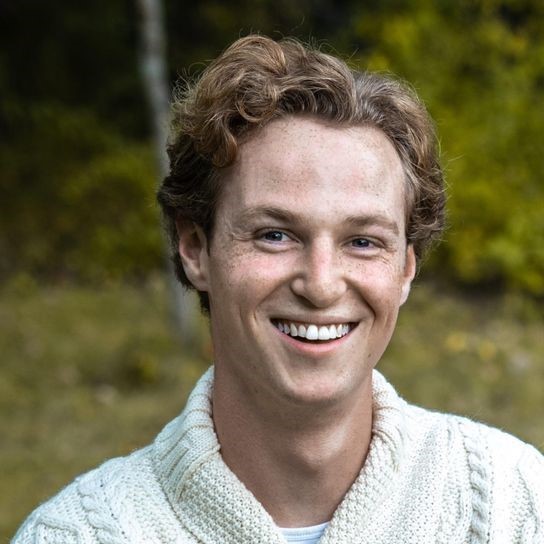Todd Dowrey wearing cream-colored knit sweater