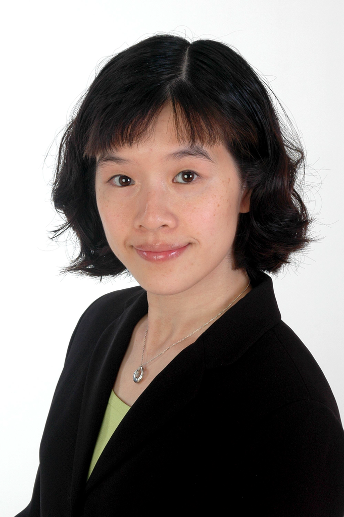 Head and shoulders shot of Dr. Kuohung wearing dark jacket
