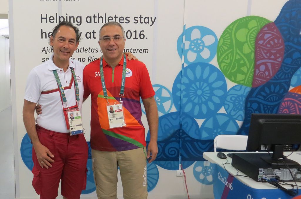 Ali Guermazi (right), a radiologist and professor of radiology and medicine, was part of a team of radiologists treating injured athletes at the 2024 Paris Summer Olympics. He previously served at the 2016 Rio de Janeiro Summer Games. Pictured with Juan Manuel Alonso, chief medical officer for the Rio de Janeiro 2016 Summer Olympic Games.