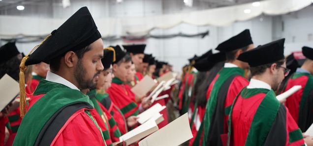 MD graduates recite the Hippocratic Oath signaling their entrance into the practice of medicine.