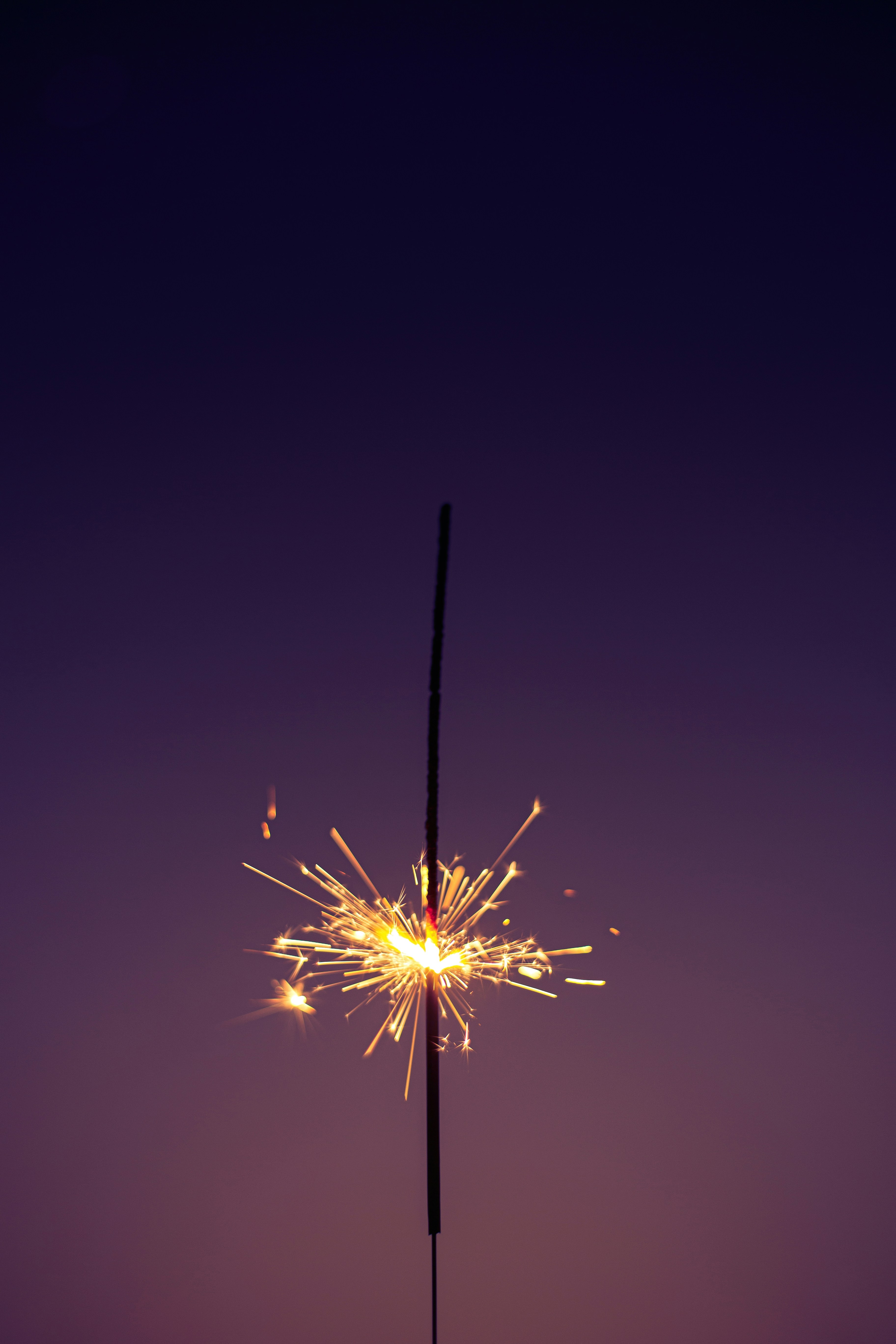 firework sparking in dark sky like a star