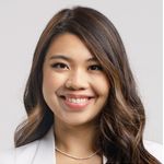 Head and shoulders image of Isa Jacoba, smiling broadly