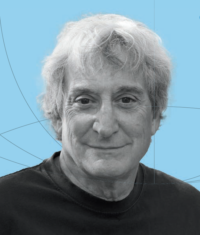 Dr. Andrew Wexler, an older man with gray hair and a dark t-shirt