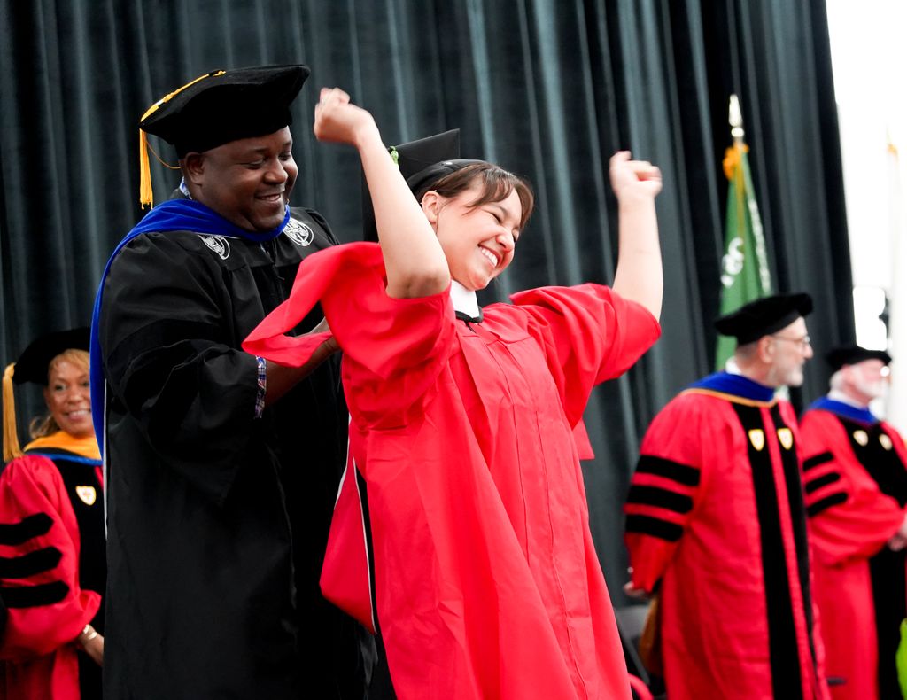 Makayla Harris, celebrates her MA in mental health counseling & behavioral medicine.